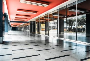 empty long corridor in the modern office building.